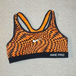 Nike Pro Sports bra. Orange & Blk print.